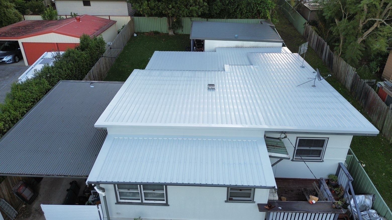 The same roof from a lower angle, showing the lower roof over the windows